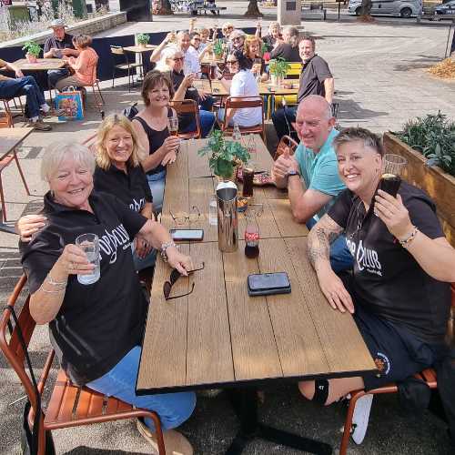 Choir members enjoying a meal together